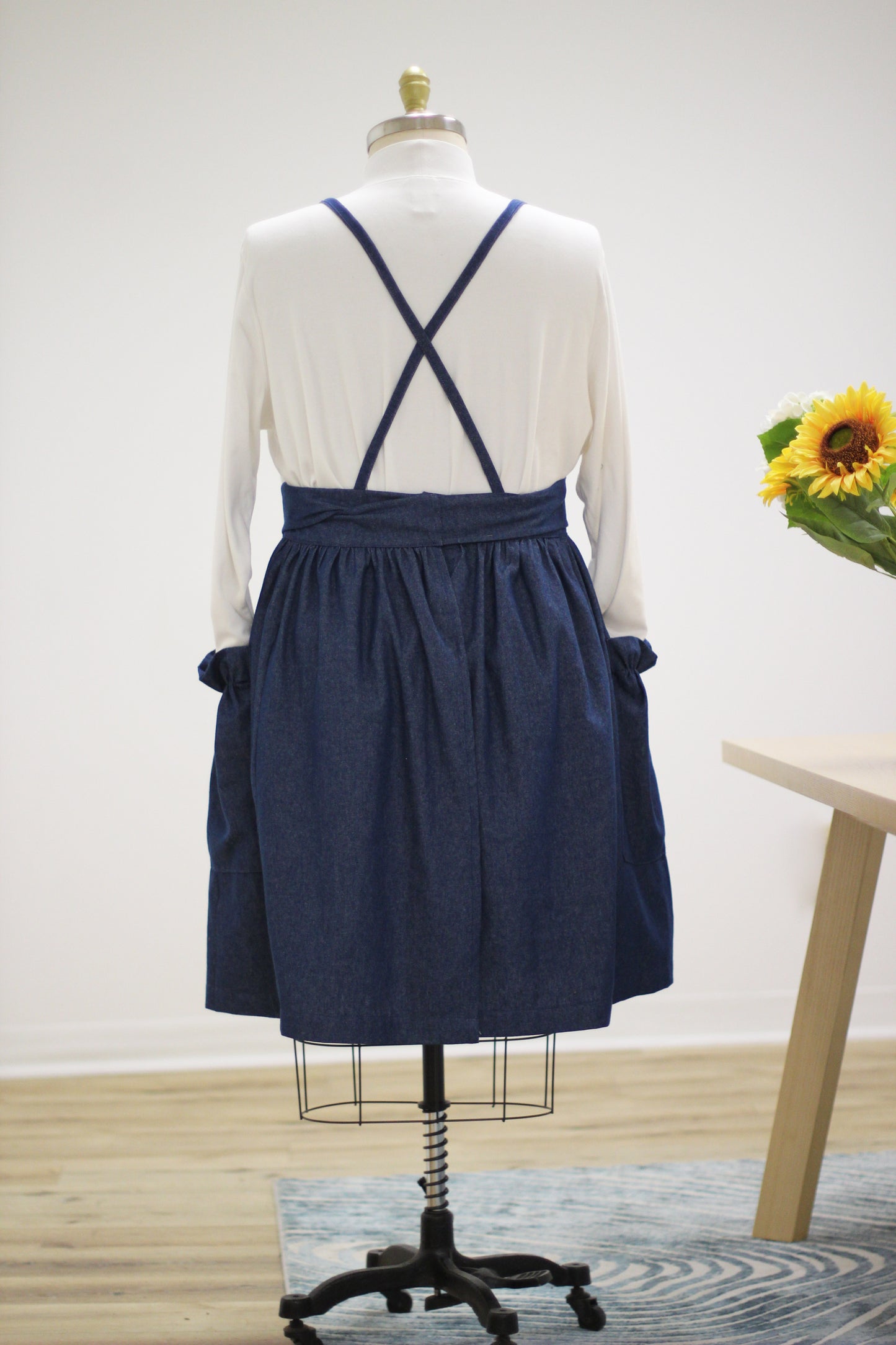 XS-5X  Gathered Bib Apron in Denim - back view showing the crisscross straps