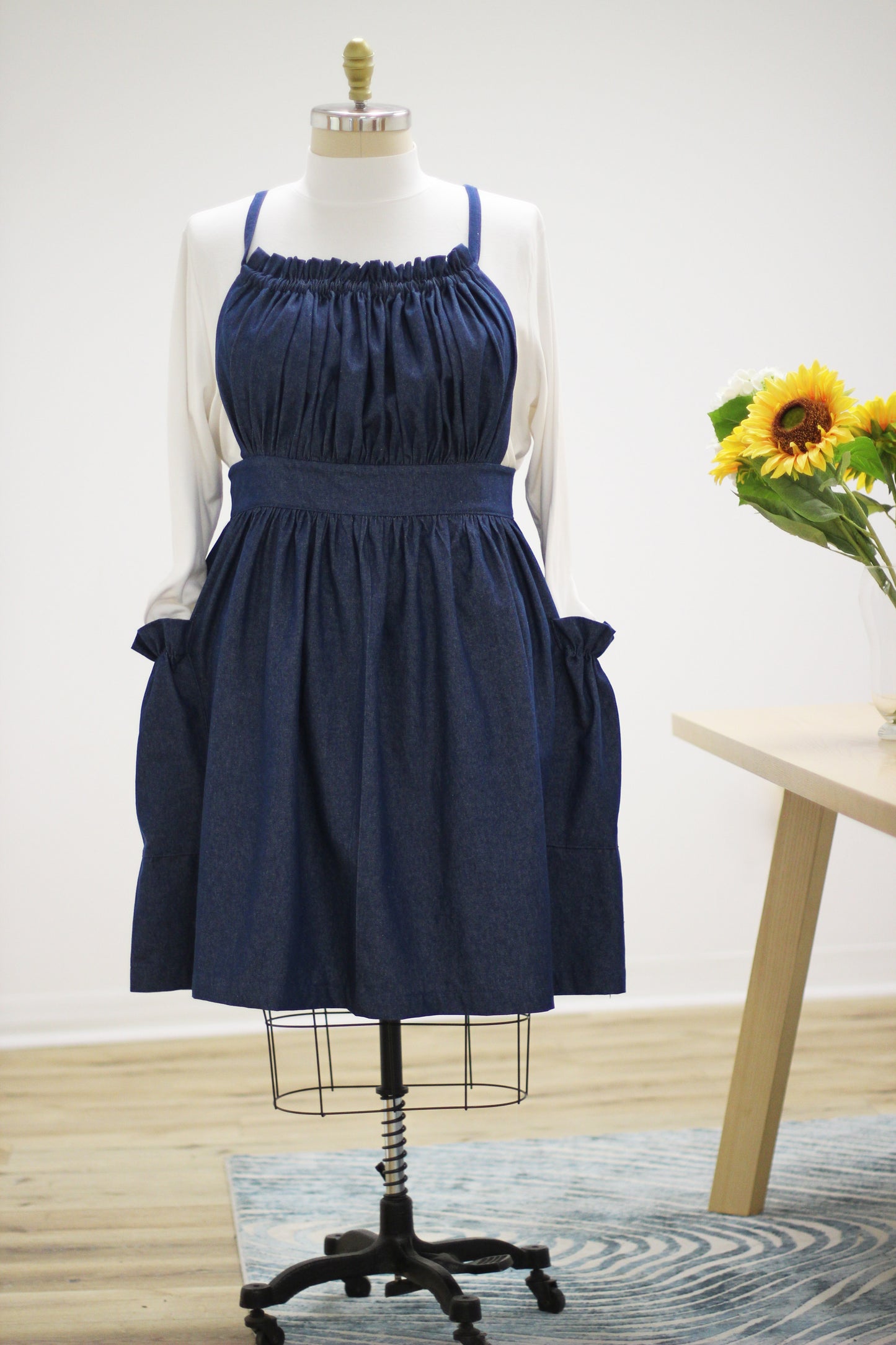 XS-5X  Gathered Bib Apron in Denim- front view with apron tied in back.